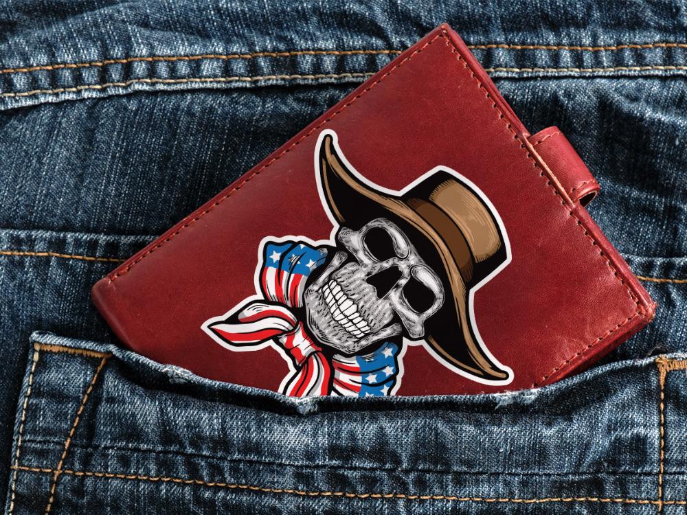 Patriotic skull sticker featuring a cowboy hat and American flag bandana, perfect for fans of Western and patriotic designs.