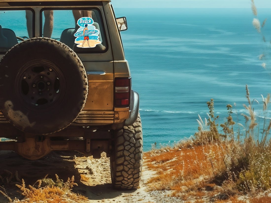 Illustration of a person on a beach holding a surfboard with the words “The Beach is Calling”, high-quality sticker.